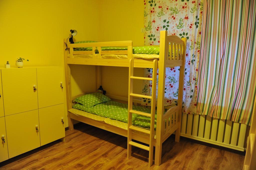 Dalian Buzz Light Year Youth Hostel Zimmer foto